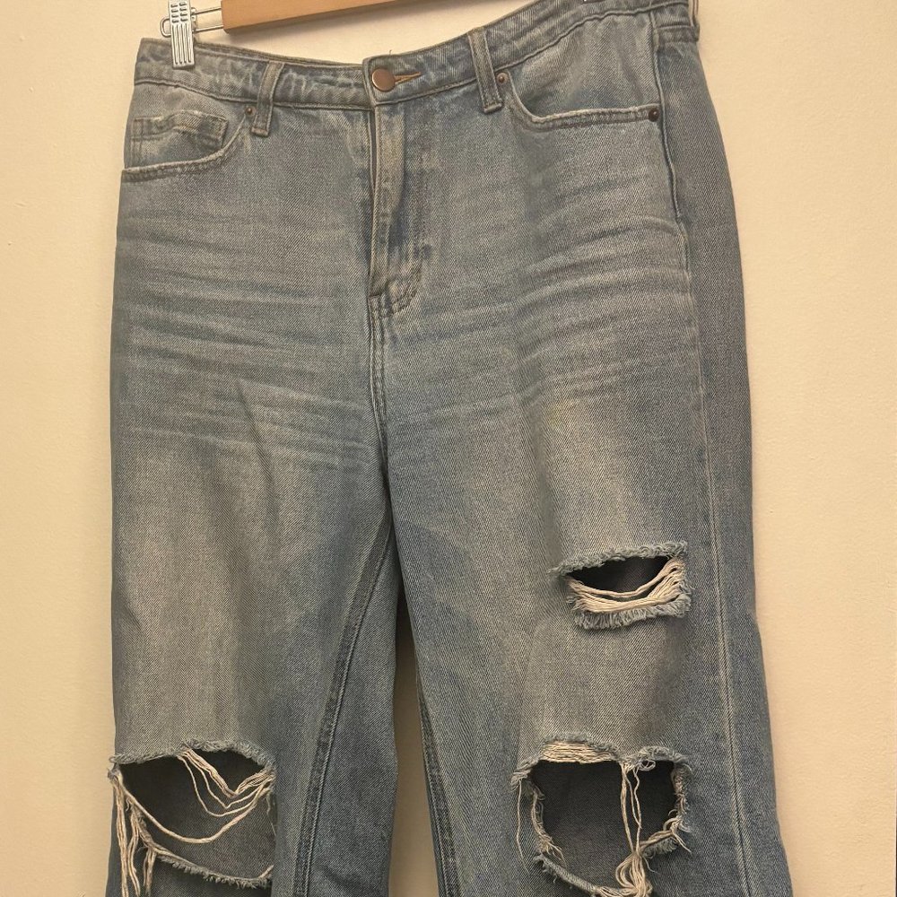 Distressed high-rise wide-leg jeans